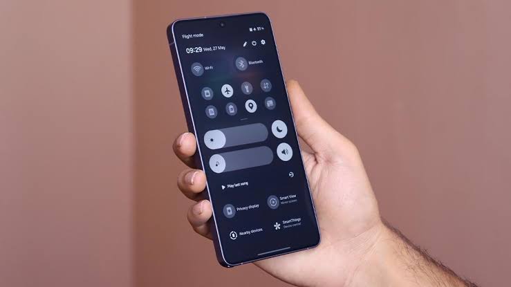 The redesigned One UI 9.0 Quick Panel with independent slider modules., AI generated