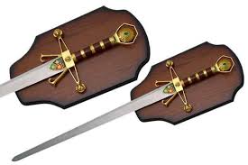 The displays and plaques are made of wood or metal. Robin Hood Sword Wall Plaque