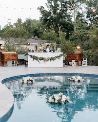 Floating flowers for pool wedding. 21 Wedding Pool Party Decoration Ideas For Your Backyard Wedding
