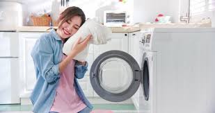 Here are some of the best ways to make your laundry smell better naturally! Woman Smelling Laundry Stock Video Footage 4k And Hd Video Clips Shutterstock