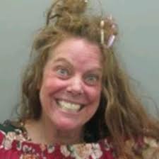 A Burlington woman has been arrested after police say she started a fire at  her home