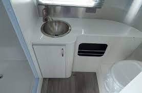 Head out to snowboard after the first fresh powder. 8 Awesome Small Campers With Great Bathrooms Kempoo