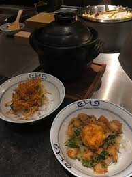Donabe means clay pot or earthenware pot in japanese. Japanese Clay Pot Rice Tempura Baby Scallop Vegetables And Egg Yolk Right Side Picture Of Ta Ke Japanese Restaurant Hong Kong Tripadvisor