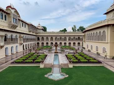 Rambagh Palace courtyard and Mughal gardens, AI generated