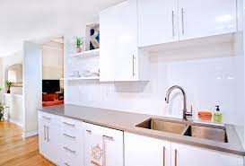 Contemporary high gloss white kitchen includes a number of elements with shiny surfaces like cabinets with high gloss fronts, glass counters or a lot of. Contemporary White High Gloss Foil Kitchen Cabinets Contemporary Kitchen Austin By Ub Kitchens Kitchen Design And Cabinets Houzz
