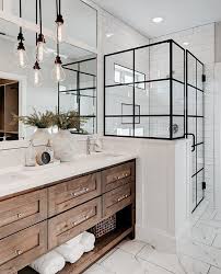A modern english cottage guest bathroom renovation featuring pale greige walls, vertical shiplap and polished nickel details. Modern Cottage Decorating Farmhouse Bathroom Decor Home Remodeling Master Bathroom Decor