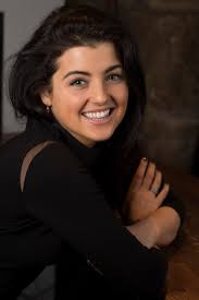 Storm Huntley snapped getting cosy and holding hands with comic Jon Culshaw