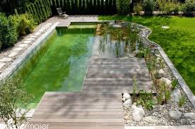 Schwimmteich Im Geniessergarten Gartendesign Flow Gartendesign Geniessergarten Im Schwimmteich Swimming Pond Swimming Pool Pond Natural Swimming Pools
