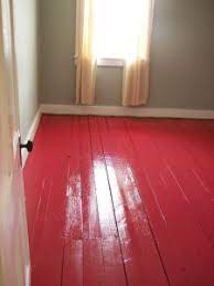 We've covered how to remove dried paint from your wood floor. Red A Bold Decision Flooring Painted Wood Floors Painted Floor