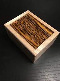 Designed by yasuhiro hashimoto and finely crafted by eric fuller out of ash and padauk, this discontinued puzzle is available to you just in time for the . Look At This Beauty Great Puzzle Box Escalating Puzzle Box Designed And Crafted By Eric Fuller R Mechanicalpuzzles