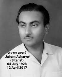 What are the characteristics of a 1950s and 1960s Indian cinema accordion  player?