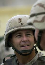 Captain (CAPT) Wheatley, US Army (USA), Chaplain assigned to the 173rd  Airborne Brigade (AB) receives a tour of a Kirkuk, Iraq (IRQ), school open  thanks to the efforts of the coalition and