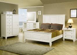 Made with acacia veneers and solids. Sandy Beach White 5pc Cal King Panel Bedroom Group