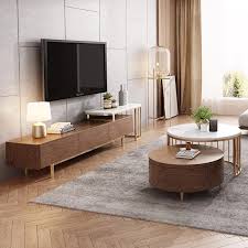 The ambry modern walnut and black coffee table exhibits a geometric movable design featuring an adjustable table top. Moderner Runder Couchtisch Aus Weissem Und Walnussholz Mit Rotierendem Marmor Nesting Couchtisch In Rotgold 2er Set In 2021 Walnut Living Room Nesting Coffee Tables Coffee Table