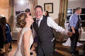 A focused beam of light that shines directly onto an object, like a your wedding style: How Wedding Photographers Can Nail Reception Lighting Improve Photography
