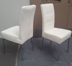 These modern chic dining chairs are the epitome of luxury. Furniture Place Nobel Dining Chair White Pu Leather Chrome Legs
