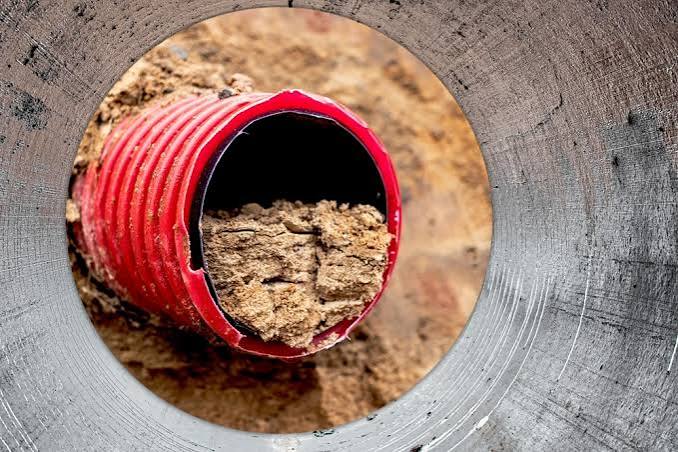Clogged Gutter Drain: How To Inspect & What To Do