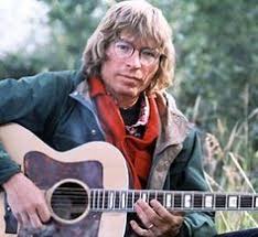 Image result for 1997 - On stage at the Grand Ole Opry, Vince Gill honored John Denver. Gill played "Take Me Home, Country Roads."