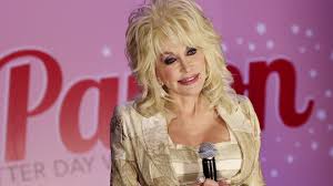 Dolly Parton Says She Has Tattoos To Cover Her Scars