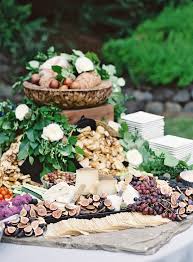 A grazing table will be a welcome sight to your guests and is the perfect way to keep them occupied while you wind down from the ceremony and spend time taking photos with your new spouse and families. 19 Grazing Tables Perfect For Your Cocktail Hour Martha Stewart