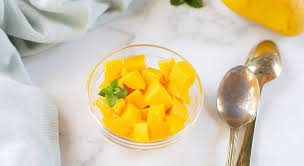 Cut around the mango's pit holding the fruit vertically, trim the remaining flesh off the pit. How To Cut A Mango Hack Best Way To Cut A Mango Create Kids Club