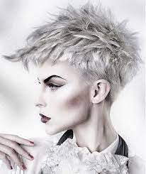 A Short Blonde Straight Coloured Choppy Platinum Womens Hairstyle By Toni Kalin Short Blonde Hair Hair Styles Short Blonde