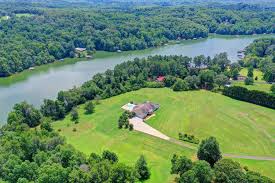 Community includes green space, walking trails, lakeside clubhouse and private 18 slip dock. 5609 Old Wilkie Road Gainesville Ga Real Estate