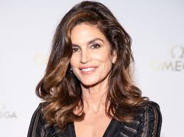 Cindy Crawford, 57, causes a stir in risqué sheer beach cover-up