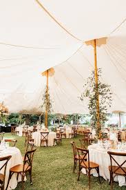 Lakeside Wedding Reception Under A Canvas Sperry Tent With Poles Dressed Wit French Country Wedding Tent Wedding Reception Lakeside Wedding Reception
