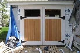 Swing Out Garage Doors How To Build In Three Steps Home Interiors Garage Doors Carriage Style Garage Doors Barn Style Garage Doors