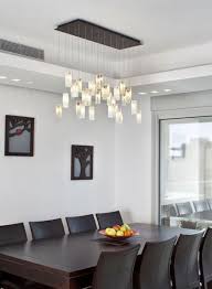 Contemporary dining room chandeliers come in a range of designs and finishes fit to take any room to the next level. Contemporary Chandeliers That Compliment Modern Homes Modern Chandelier Dining Modern Dining Room Lighting Dining Room Chandelier Modern