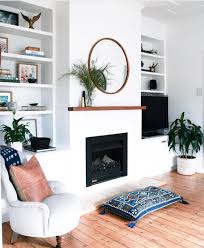 Modern walnut fireplace mantel with drop front shelf, media storage, hidden storage. 12 Round Mirror Over Fireplace Ideas Home Living Room Mirror Over Fireplace Round Mirror Over Fireplace