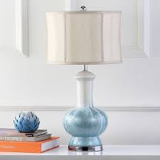 A traditional accent lamp can incorporate any of these design elements. Safavieh Table Lamp