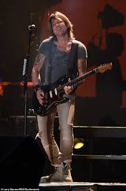 The mythological meaning behind the creature is all about what doesn't kill you makes you stronger. Keith Urban Flaunts His Highlighted Locks As He Performs In Florida Express Digest