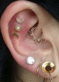 Steal These 30 Ear Piercing Ideas Daith Earrings Ear Jewelry Piercing Jewelry