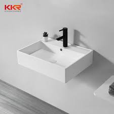 This wall mount bathroom vanity top is an elegant and modern sink with the unparalleled sophistication that will be an ideal addition to your current bathroom or bathroom remodel project. Hot Selling Small Size Wall Mounted Bathroom Washhand Basin Bathroom Sink Kkr Stone