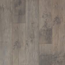 If you're renovating a smaller space, light grey laminate flooring will create a calming, airy atmosphere whilst also making the room feel and look bigger to you and your guests or you can lay dark laminate flooring and add contrasting bold colours in to the mix to give your house a contemporary style update. Pergo Xp Summit Grey Oak 8 Mm T X 7 48 In W X 47 24 In L Laminate Flooring 19 63 Sq Ft Case Lf001001 The Home Depot