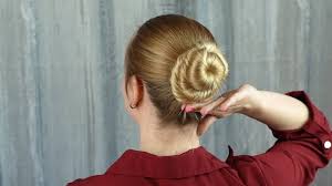 The combination of bobby pins, strong hairspray and a headband also help a lot. Making A Bun With Long Hair No Donut The Socialite S Closet