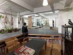 Natural Office Love For Nature Open Space Showroom Integrates An Interior Garden Showroom Design Interior Architecture Interior