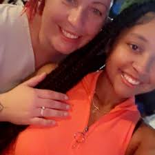 Labradoodle and full-blooded lab puppies