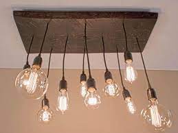 Check spelling or type a new query. Funky Rustic Wood Chandelier Custom Made With Variety Of Edison Bulbs Custom Made Via Wood Chandelier Rustic Rustic Light Fixtures Contemporary Light Fixtures