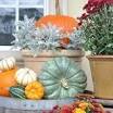 porch decorating for fall from www.goodhousekeeping.com