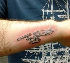 It's sure to be federation approved. Minimal Star Trek Tattoo Novocom Top