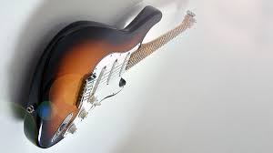 Mount guitar hangers on those as well. Hoverguitar Is The World S First Invisible Guitar And Bass Wall Mount Musicradar