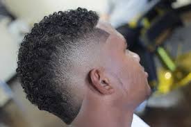 The mohawk (also referred to as a mohican) is a hairstyle in which, in the most common variety, both sides of the head are shaven, leaving a strip of noticeably longer hair in the center. 70 Stunning Curly Mohawk Designs 2021 Bad Boy Style