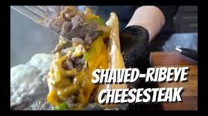 Shaved rib eye steak sandwich. How To Make The Best Cheesesteak Shaved Ribeye Cheesesteak Recipe Youtube