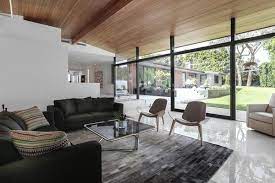 Minimalist mid century modern living room with a classy touch. Photo 14 Of 38 In The Pinstripe House Mid Century Modern Minimalism Available For 7 750 000 Dwell