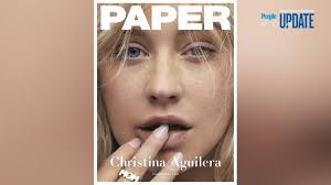 Ariana grande looks unrecognizable without her ponytail on the cover of british vogue. A Stripped Down Ariana Grande Talks Ptsd After Manchester In Vogue