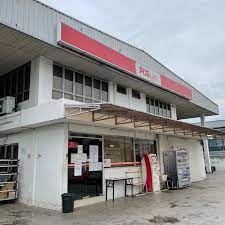 As your home away from home, the small hotel rooms offer a flat screen tv and a desk. Pos Laju National Courier Post Office