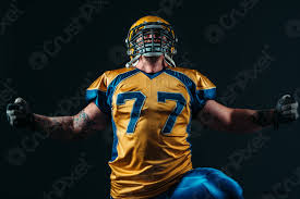 All the football fixtures, latest results & live scores for all leagues and competitions on bbc sport, including the premier league, championship, scottish premiership & more. American Football Spieler In Uniform Und Helm Foto Vorratig Crushpixel